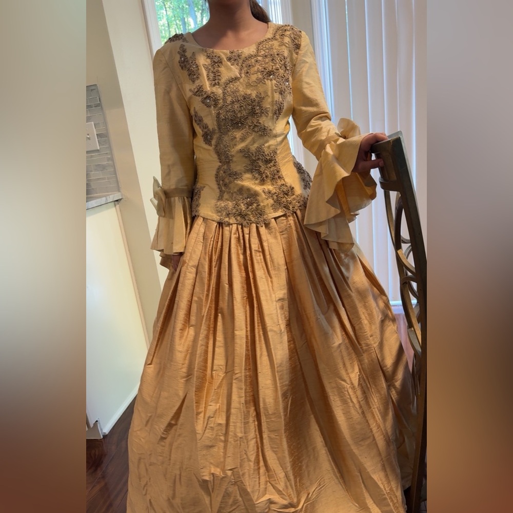 Elegant Gold Gown with Lace Details